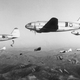US Air Force Curtiss C-46D Commandos drop paratroopers of the US Army’s 187th Regimental Combat Team during a training exercise in Korea in 1950 (US Department of Defense)